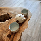 Gaiwan travel tea set with 2 cups and carrying case on live edge wooden table