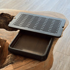 Small black tea tray chaban top view showing drainage grid pattern