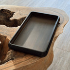 Black chaban tea tray side view showing depth and drainage reservoir