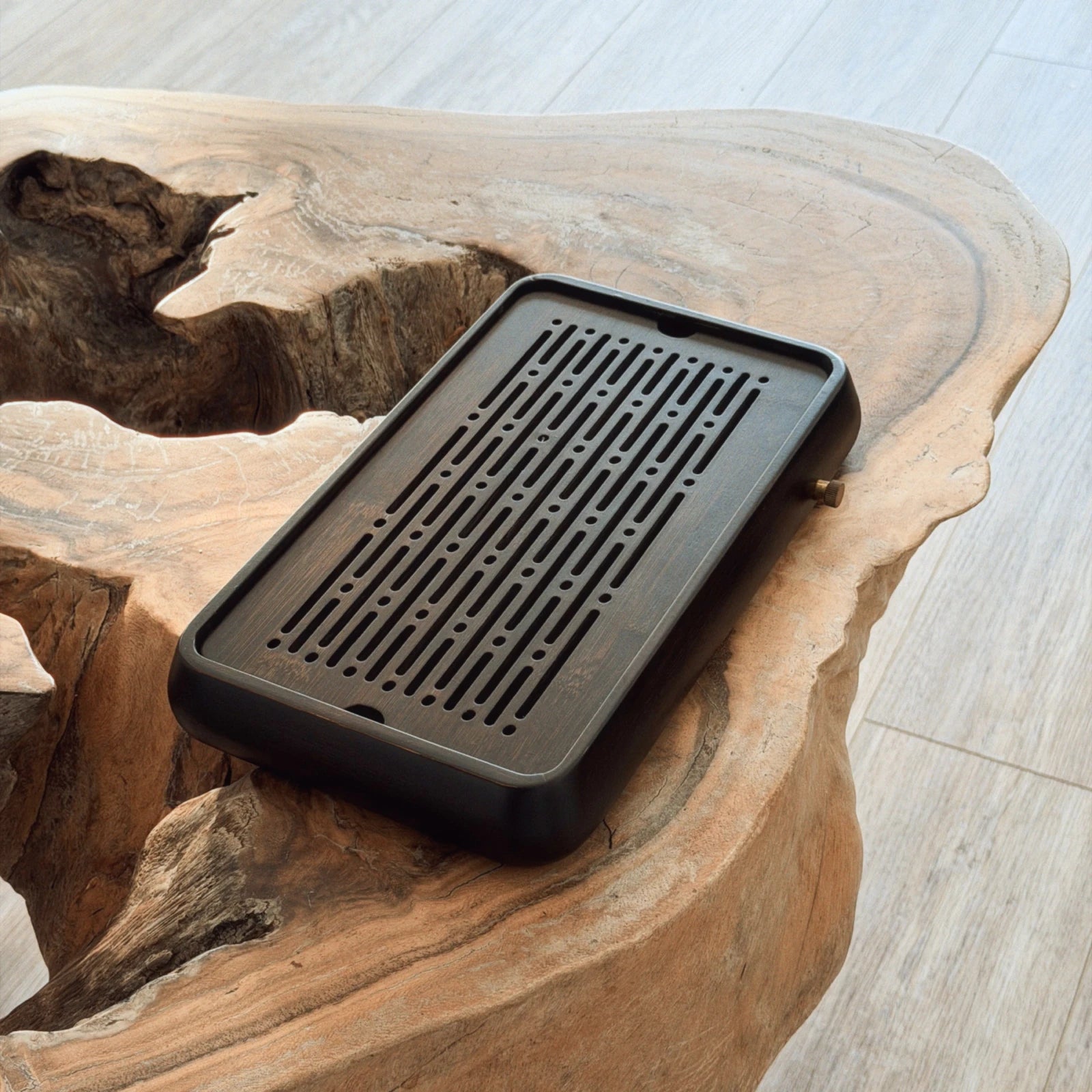 Black chaban tea tray small size on natural live edge wooden table