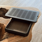 Small black tea tray chaban top view showing drainage grid pattern