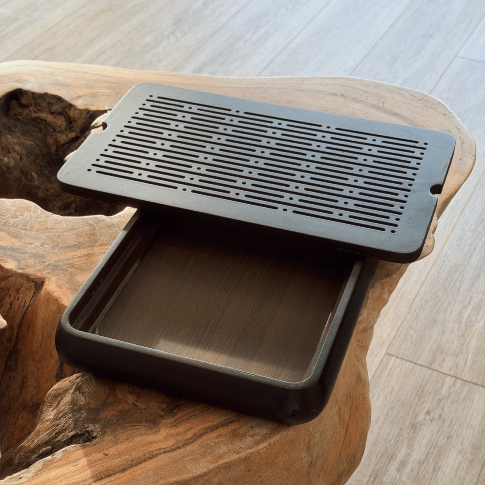Small black tea tray chaban top view showing drainage grid pattern
