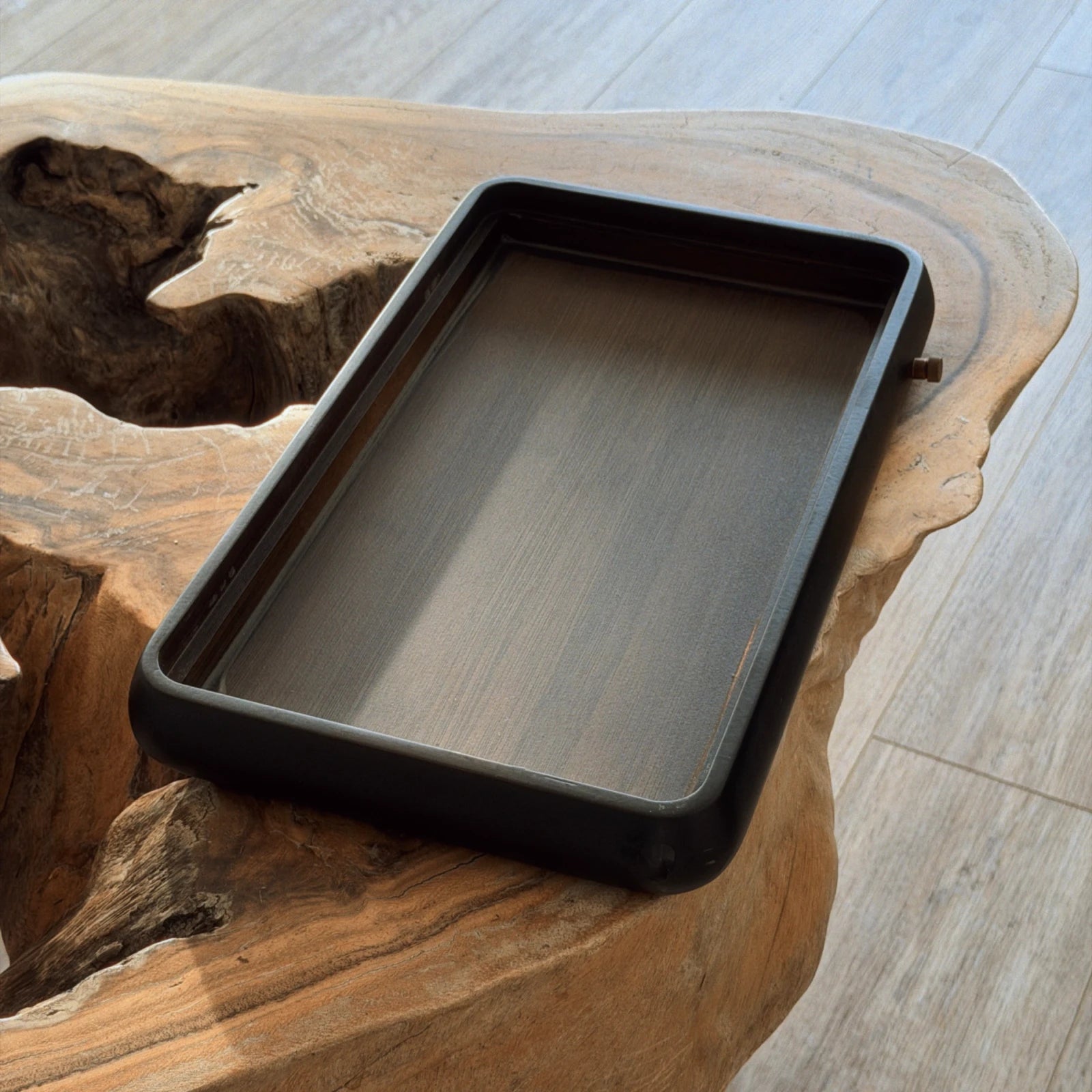 Black chaban tea tray side view showing depth and drainage reservoir